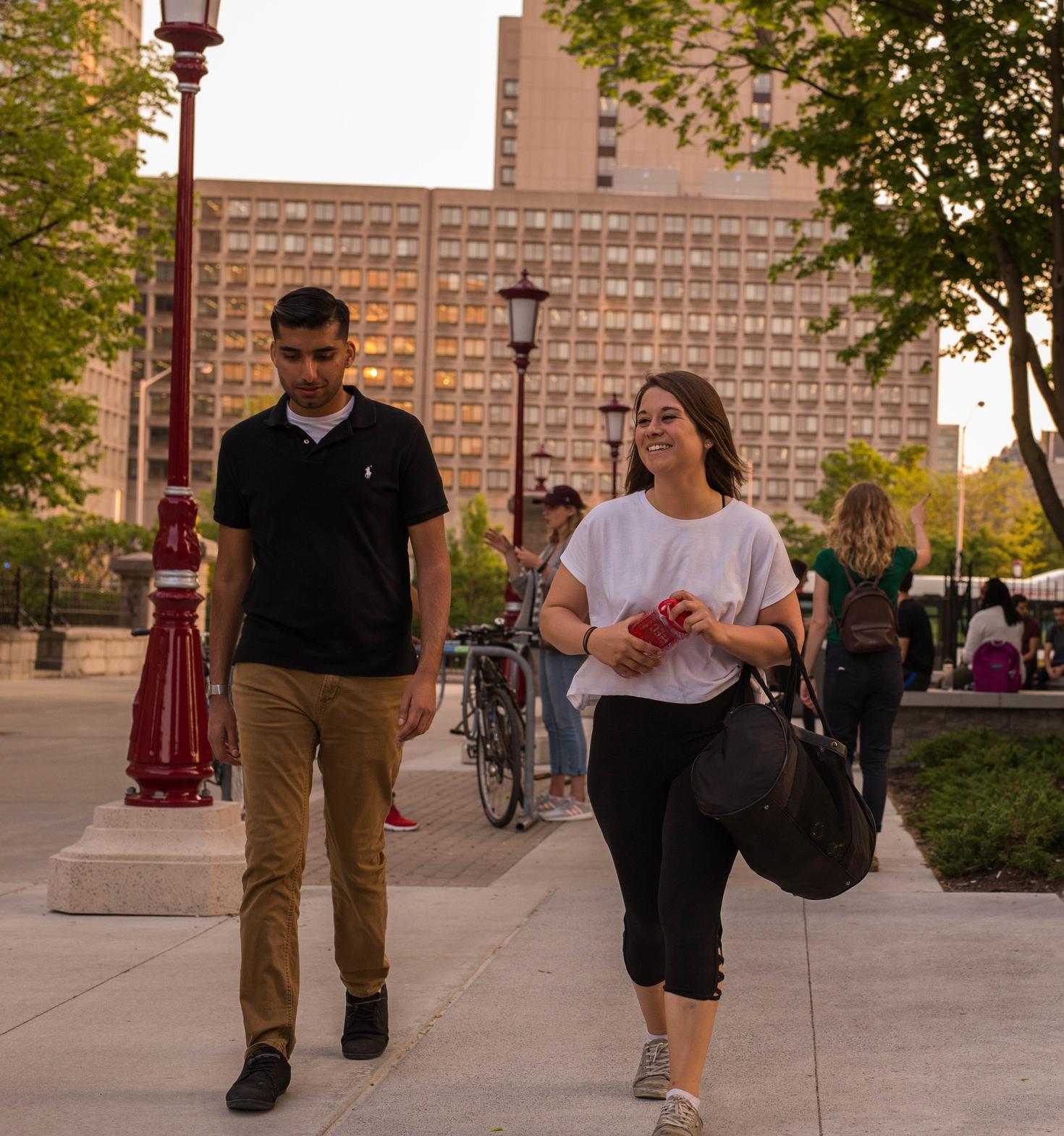 People walking around campus.