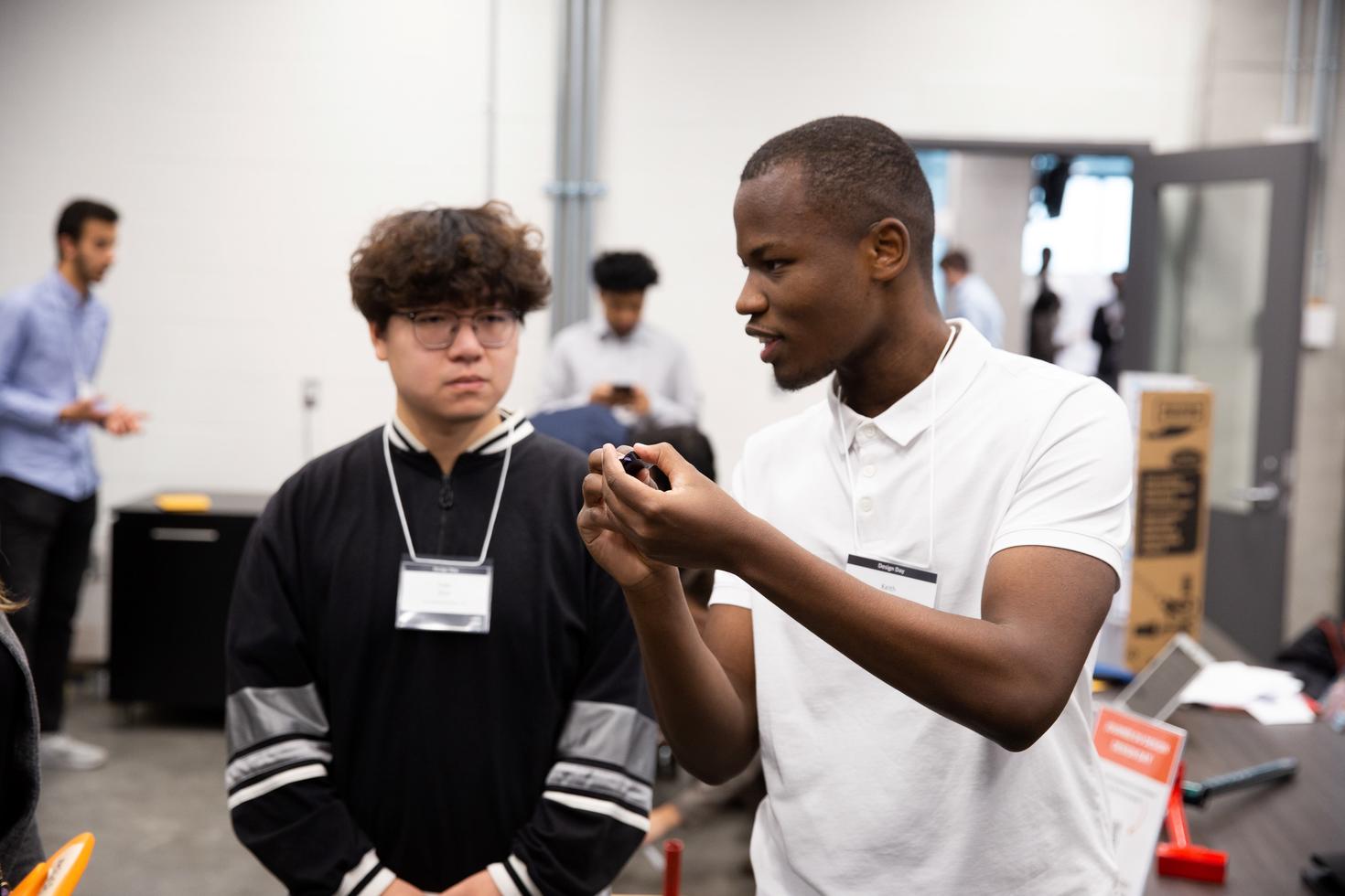 Two students working on a design project