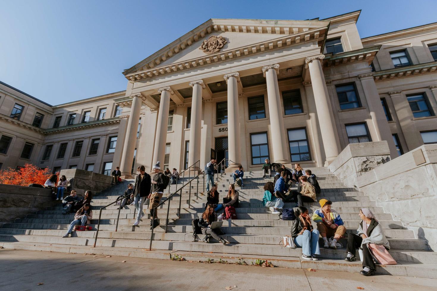 Students in Tabaret Hall stairs