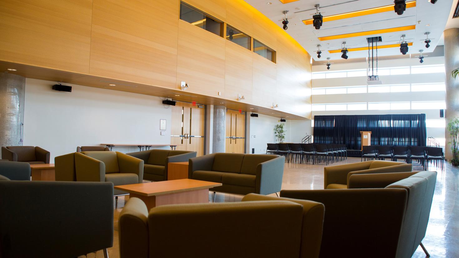 Camille Villeneuve view of seating area and presentation set up.