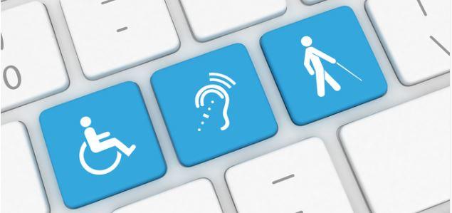 les icônes d'un fauteuil roulant, d'un symbole de malentendant et d'une personne malvoyante, sur un clavier
