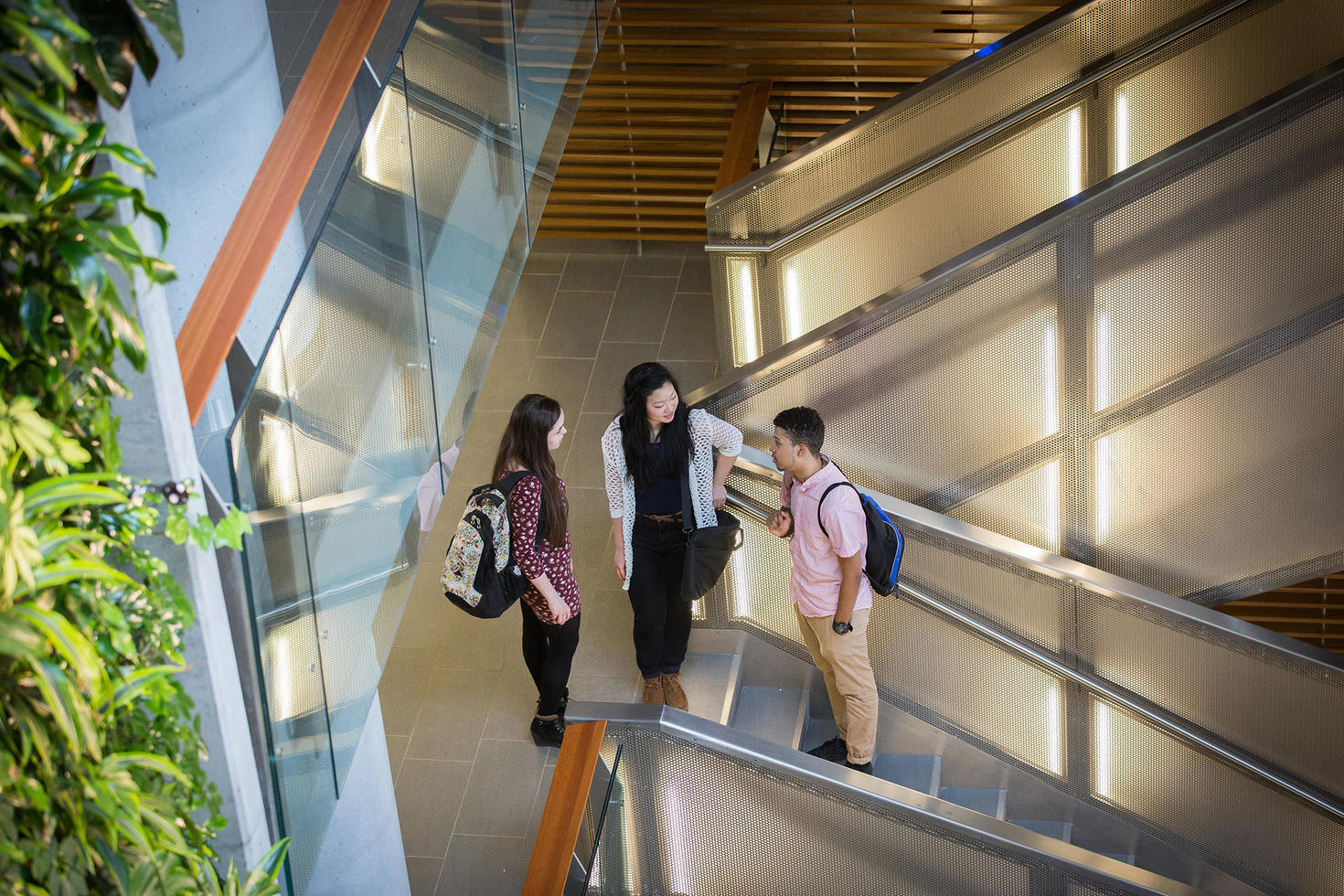 Students talking by the stairs
