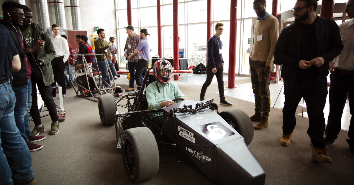 A student in a car