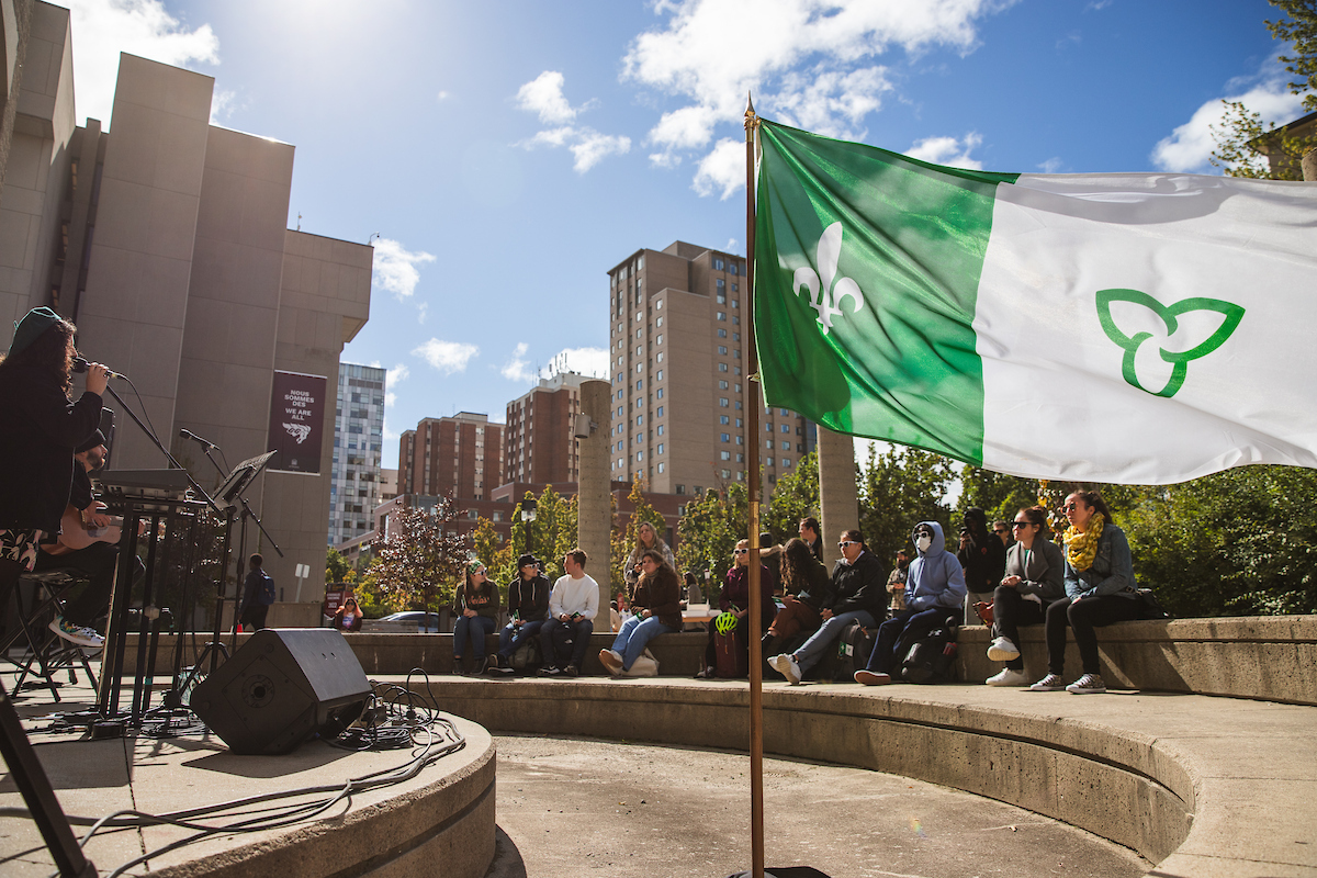 Franco-Ontarian flag on campus during an event