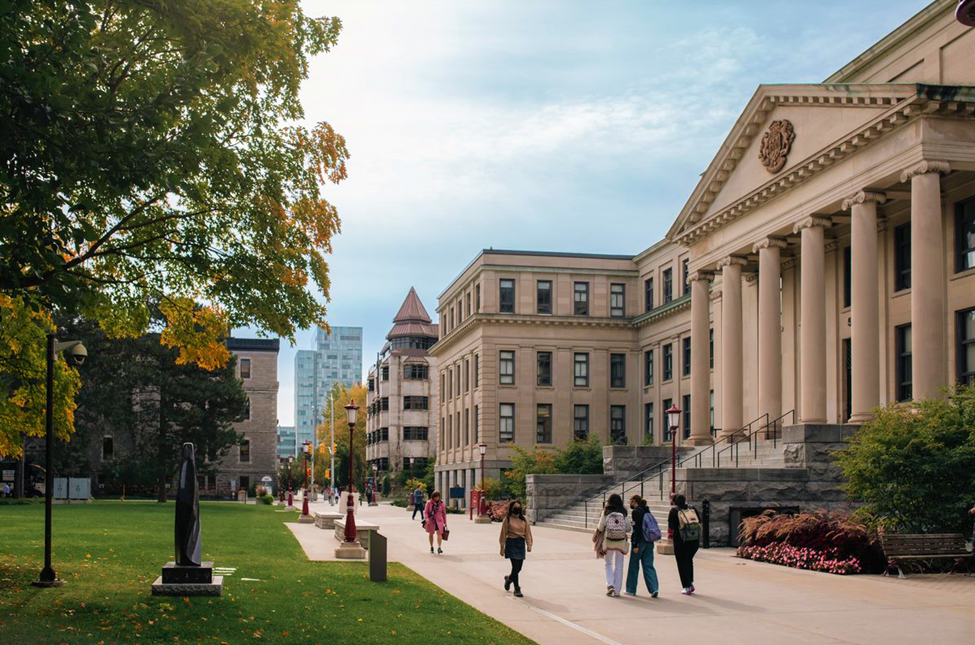 Picture of people walking in front of Tabaret Hall