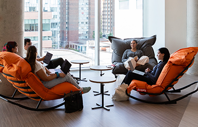 Students sitting in INNNOVA space