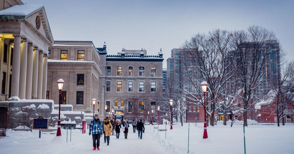 Students walking past Tabaret Hall