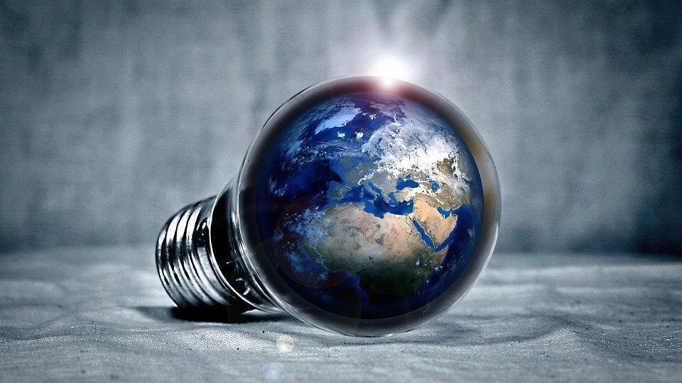 image of the earth in a lightbulb