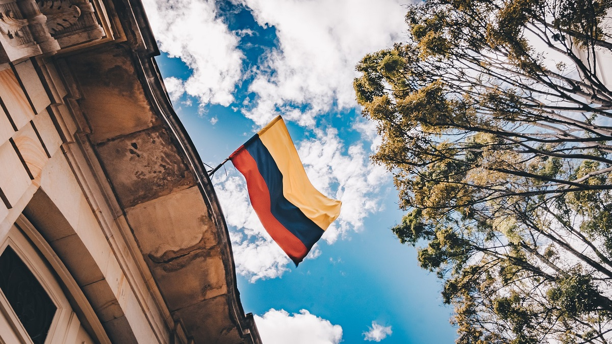 Colombian flag hanging from a building