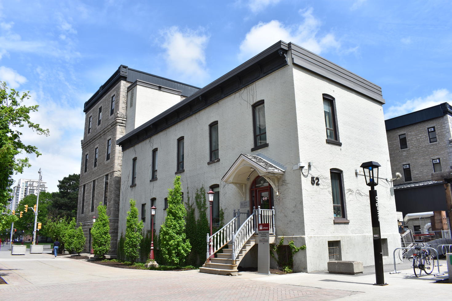 Exterior wide shot of William Commanda Hall, building that houses the Institute of Indigenous Research and Studies