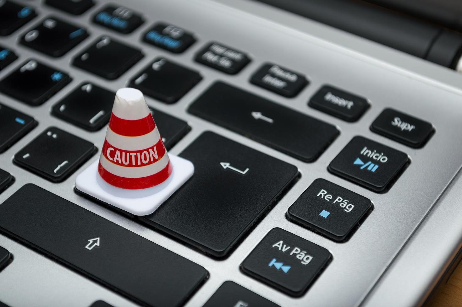 Caution cone on enter key of keyboard