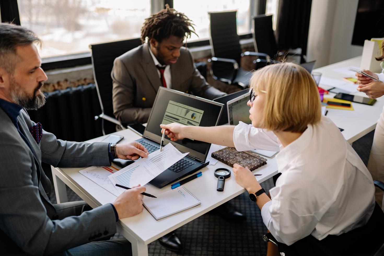 Three people having a meeting. 