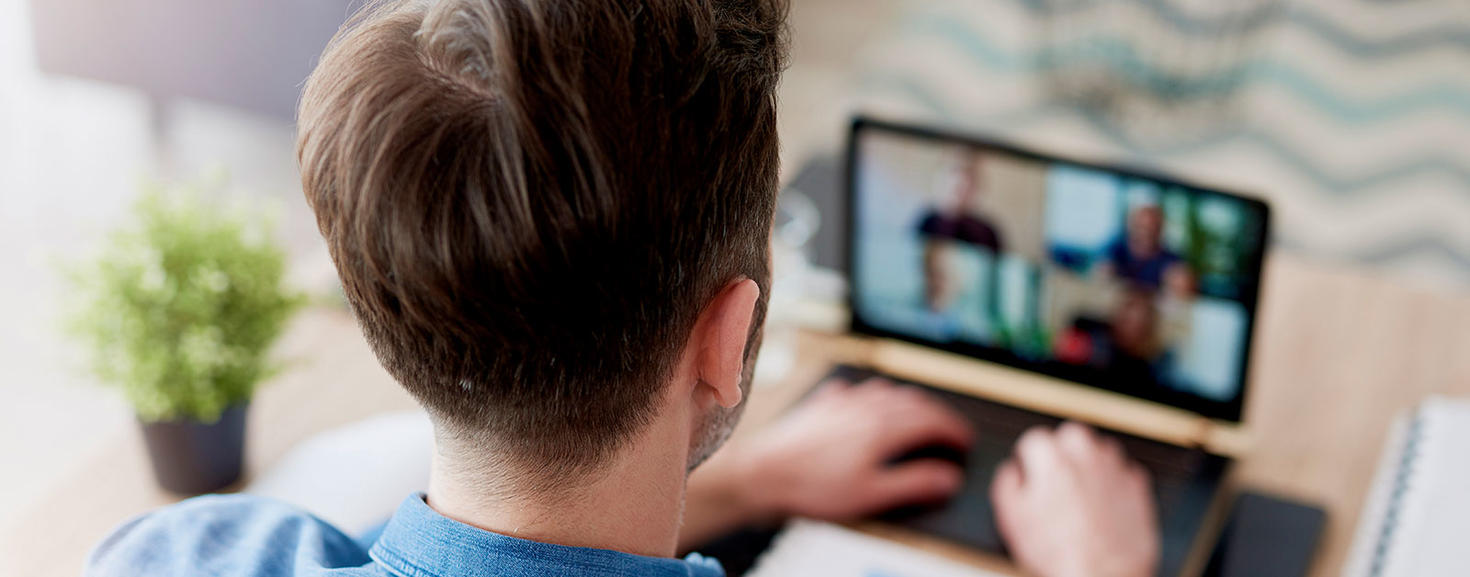 Man on a video conference call.