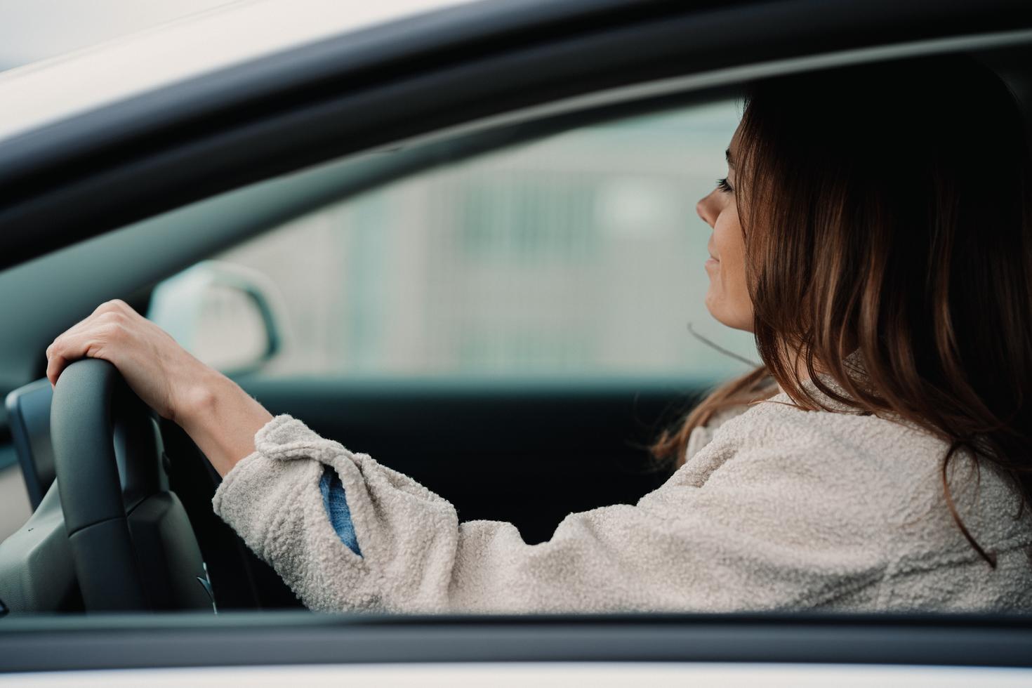 Person driving car.