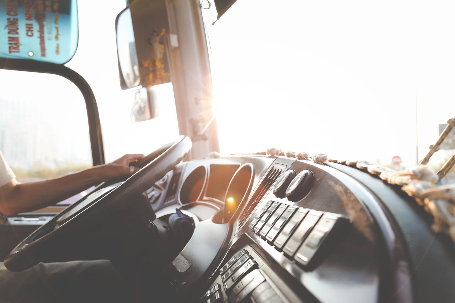 Dash and steering wheel of shuttle bus.