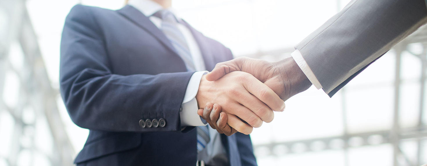 Men shaking hand.