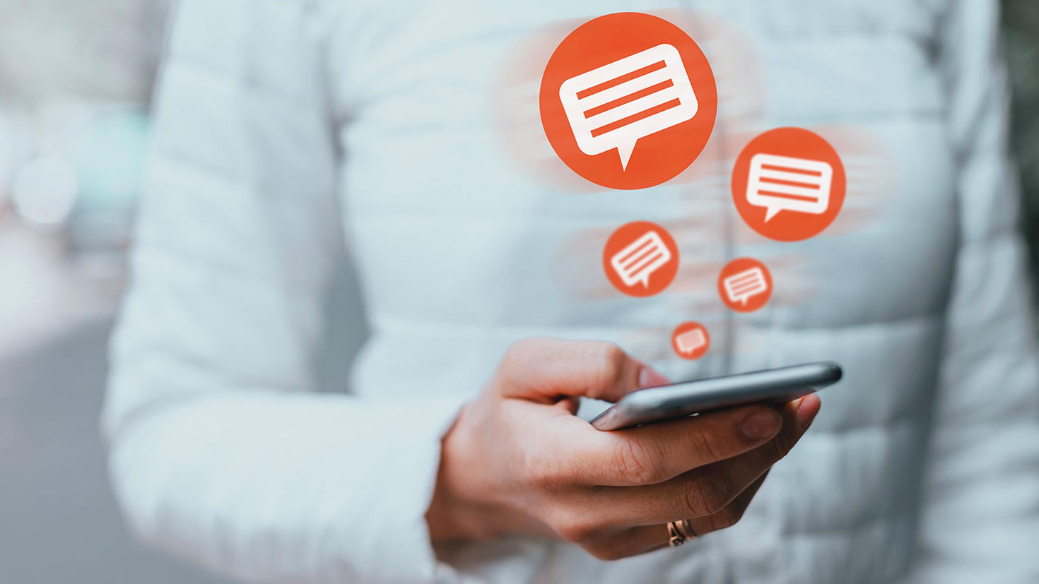 Someone checking their message on their phone.