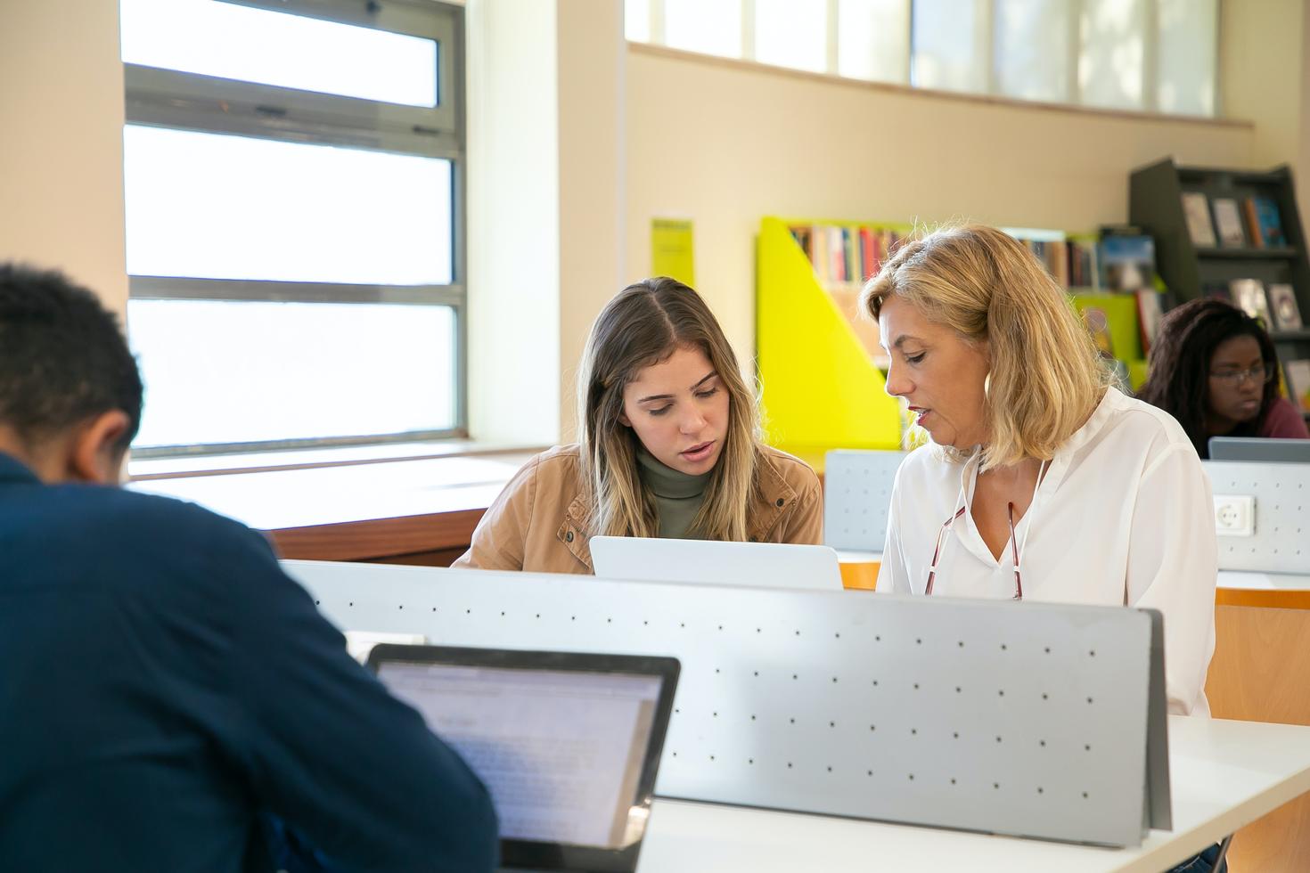 Professor working with students