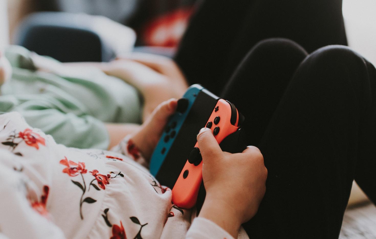 Child playing Nintendo Switch
