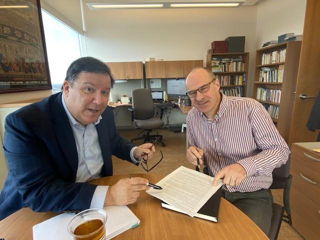 Professor Meunier and Eric Chevaucherie sitting in a working session