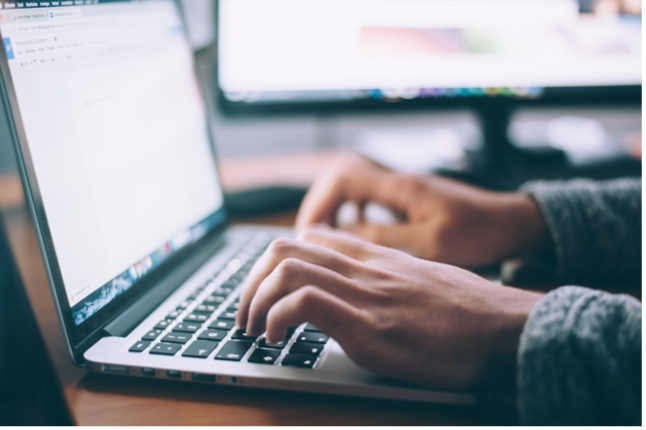 An employee using a laptop