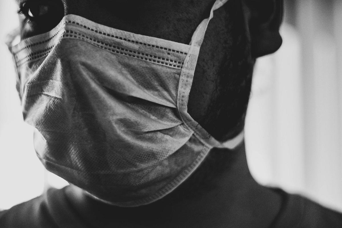 Black man wearing protective mask