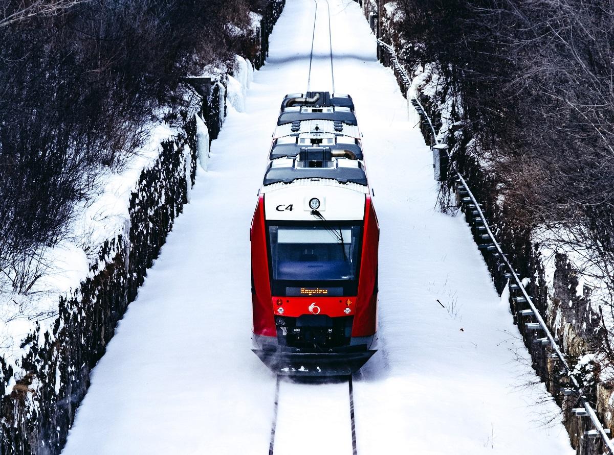 Ottawa LRT train on tracks in winter