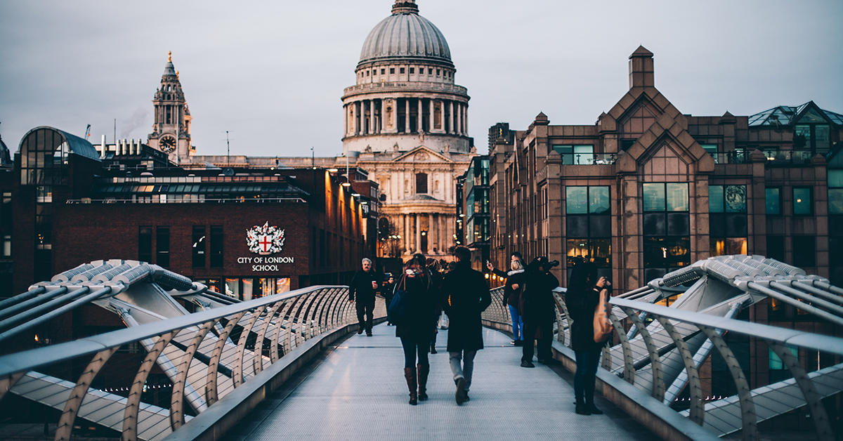 People walking on a bridge in London