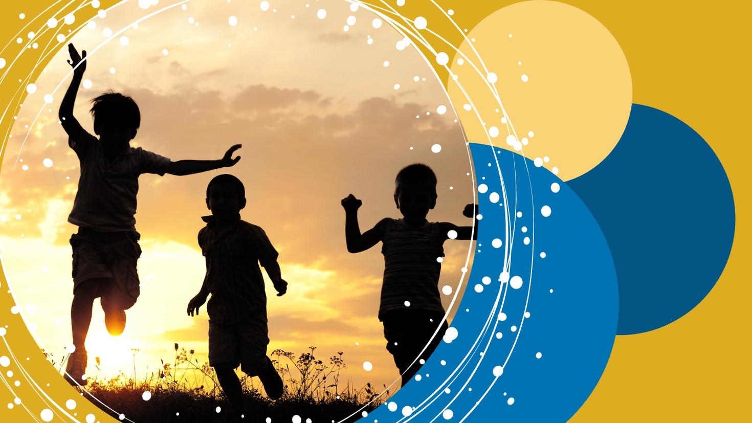 Three silhouettes of children in the sunset