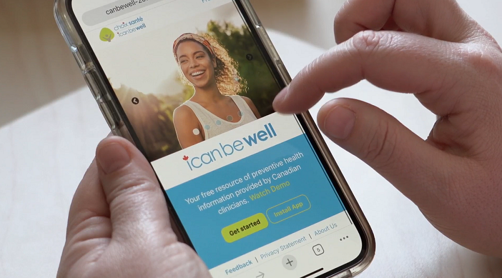 Fingers scrolling through icanbewell app on mobile phone