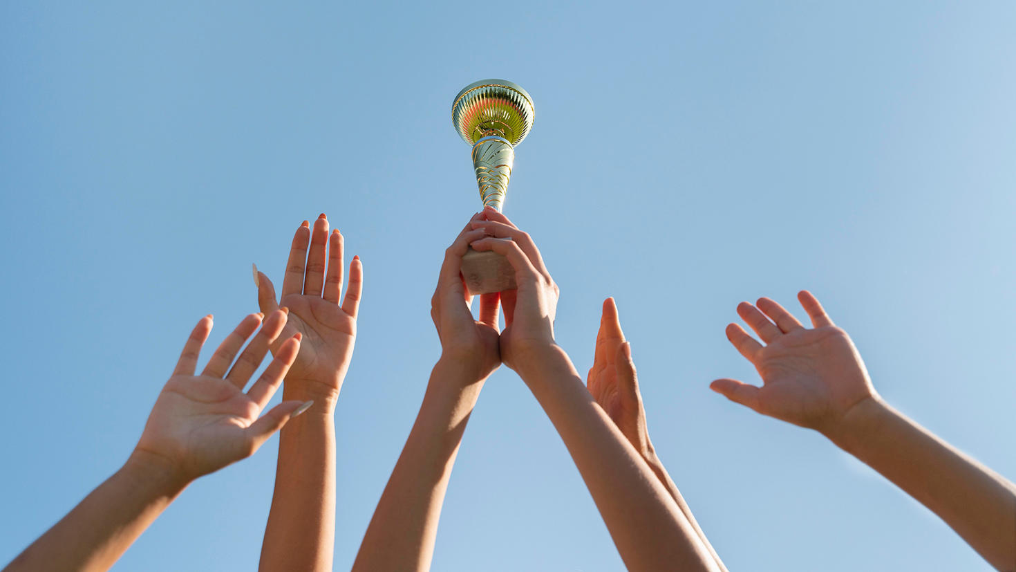 young-women-holding-sports-cup