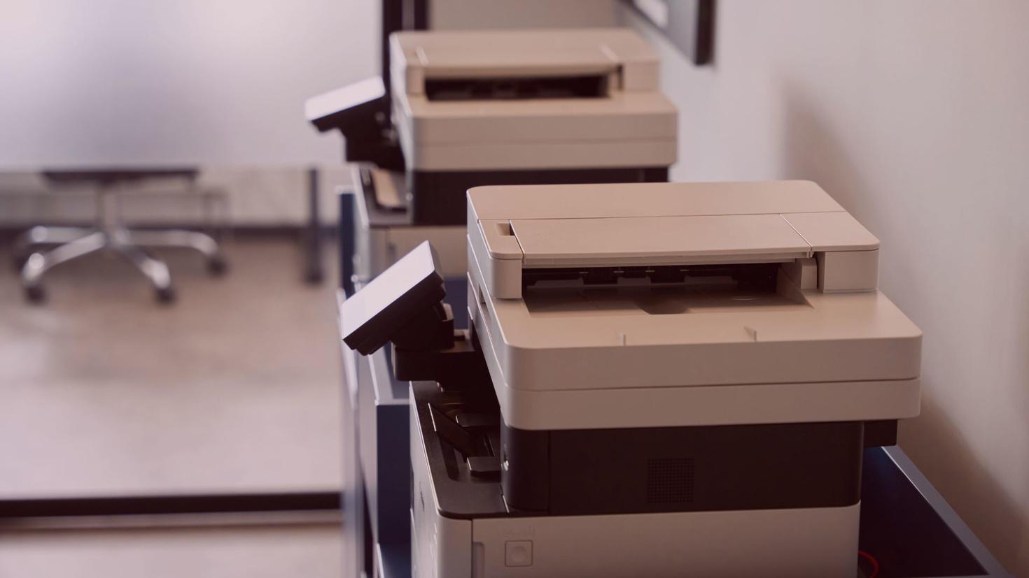 Group of printers in a room 