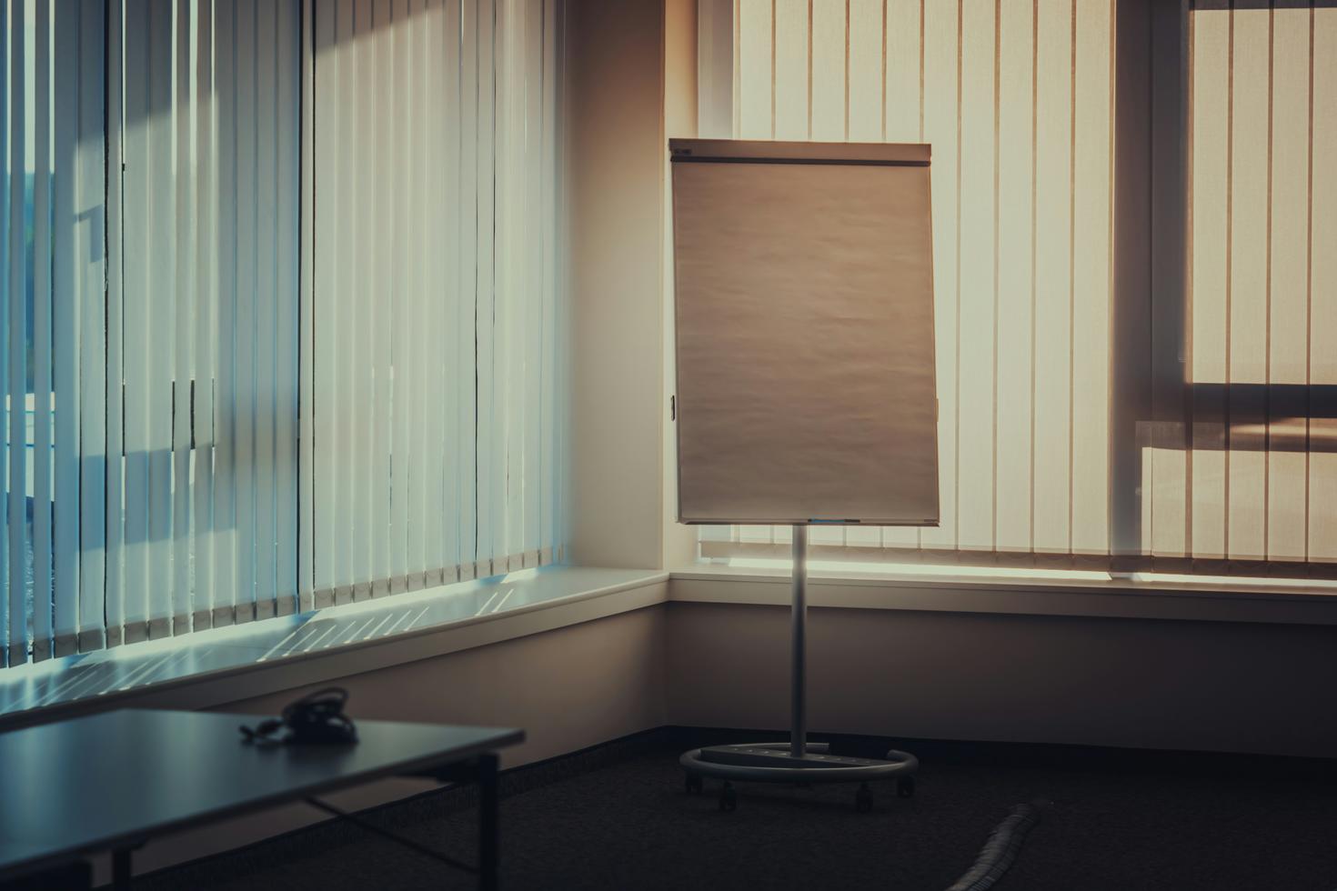 view of a flipchart in the corner of a room