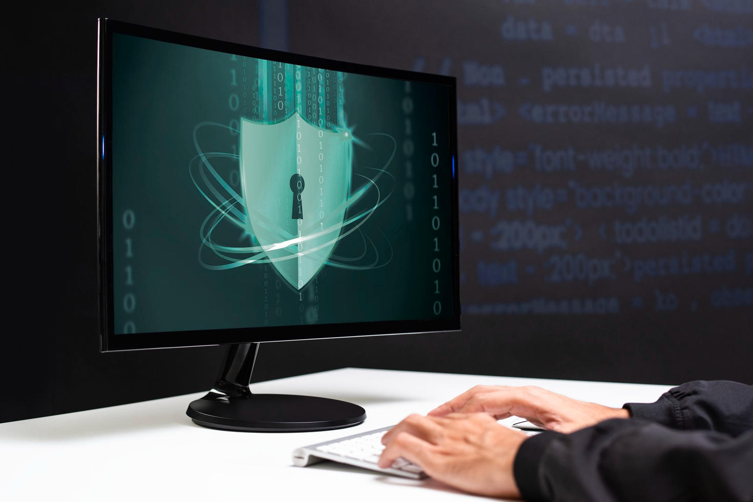 man typing cybersecurity