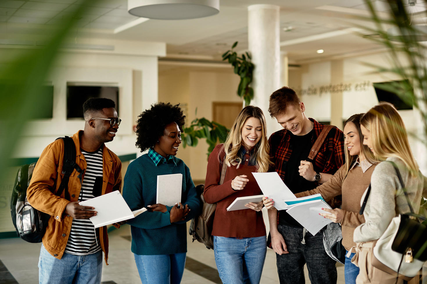 Students standing and discussing