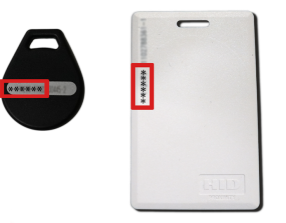 Black key fob and a white access card