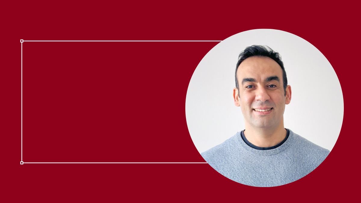Ahmed Chergaoui, IT employee headshot in a grey circle on a red background