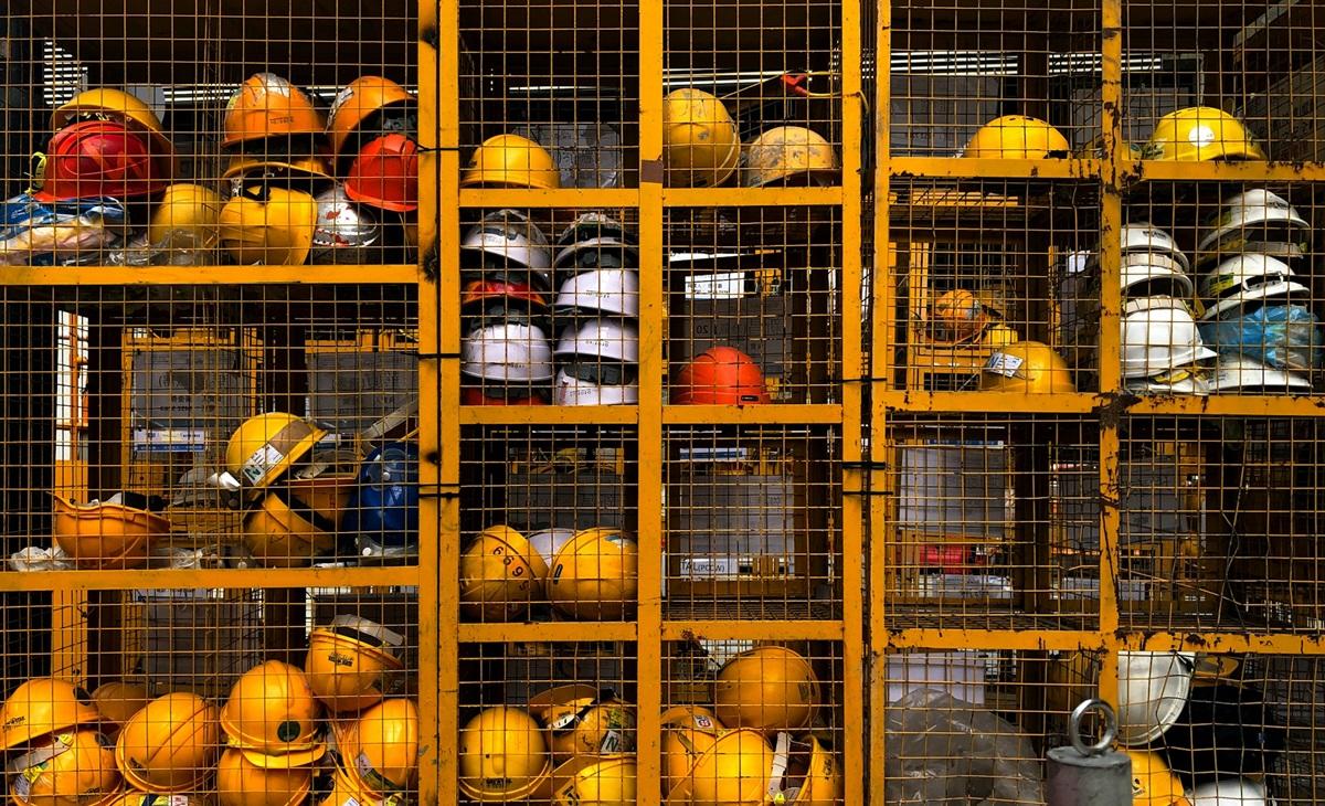 Piles of construction helmets 