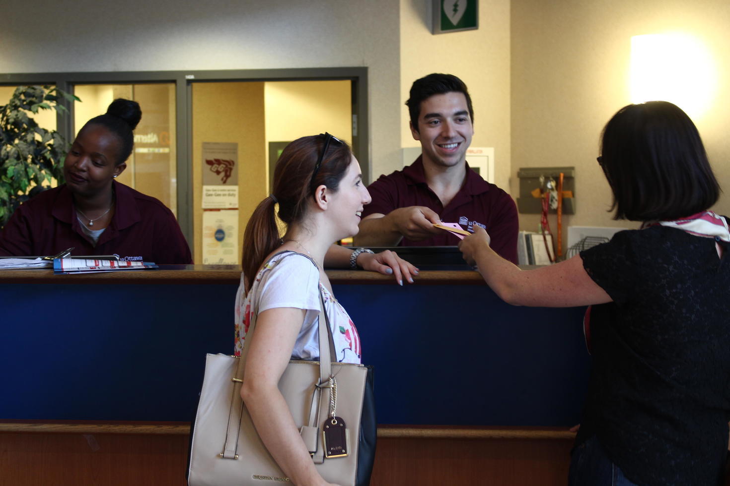 Staff working at residence counter