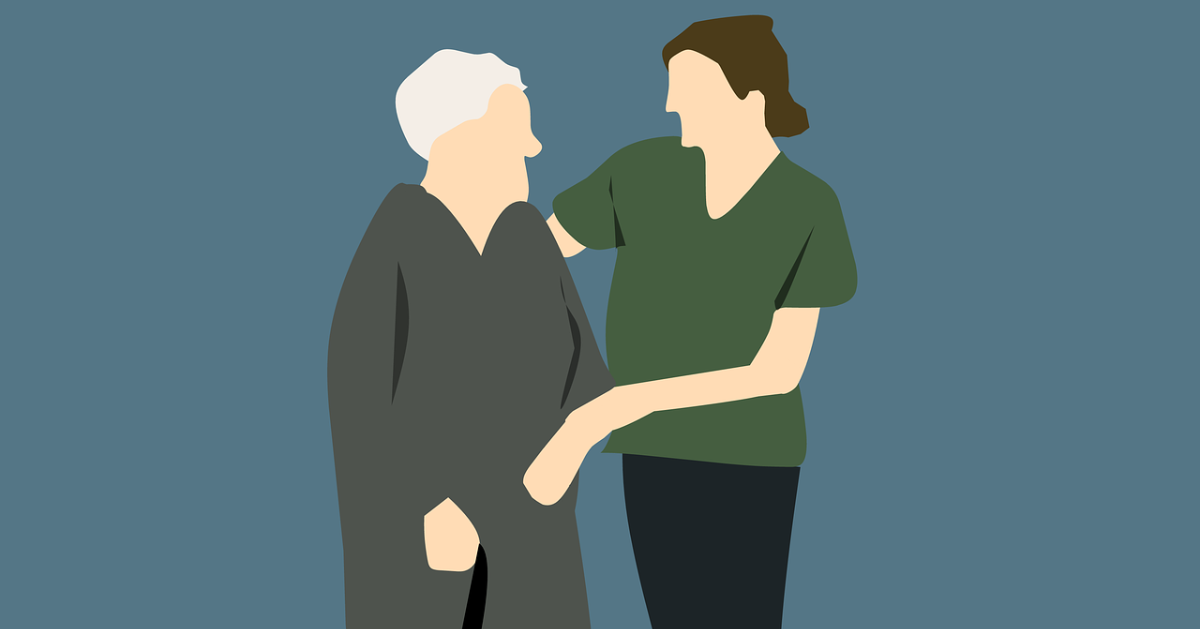 A nurse helping a senior
