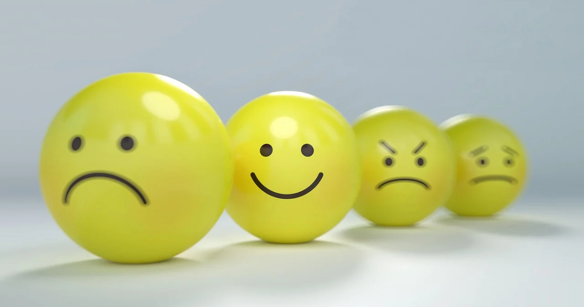 Sad, happy and angry emoji yellow balls