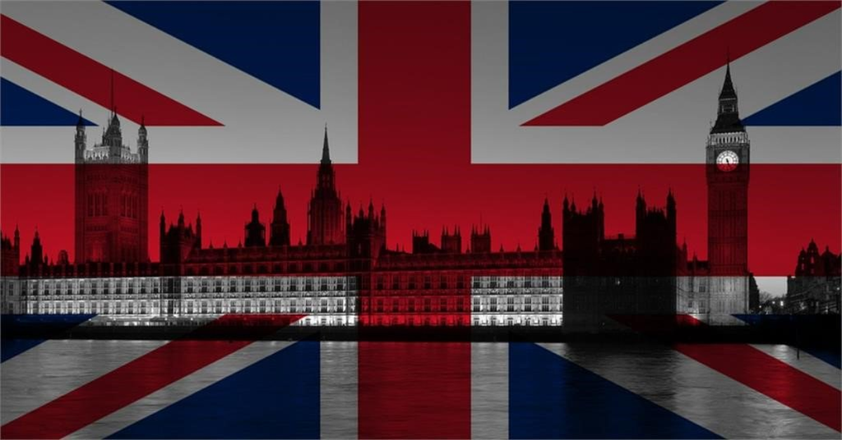 The British Parliament with the Union Jack in the background.