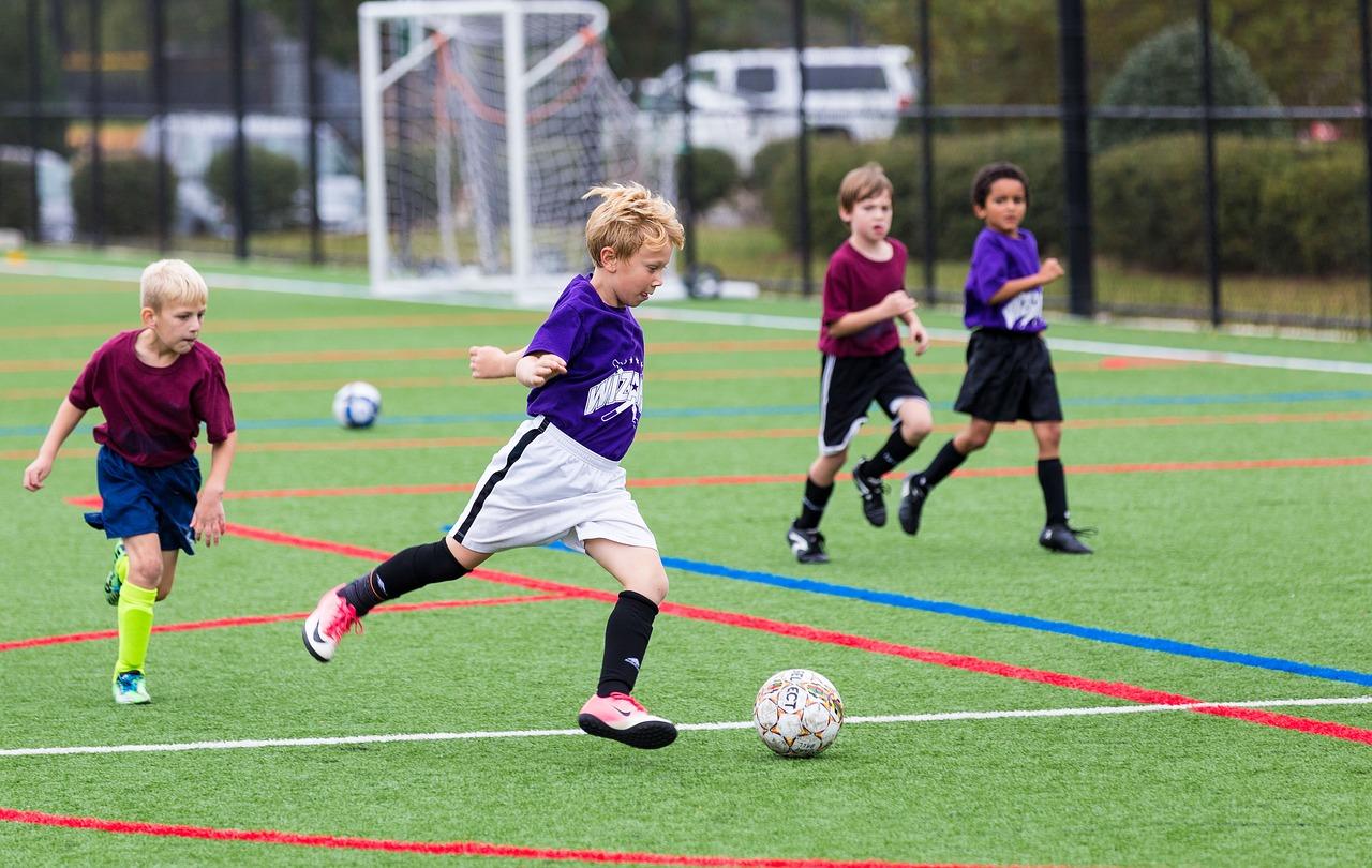 Children playing soccer