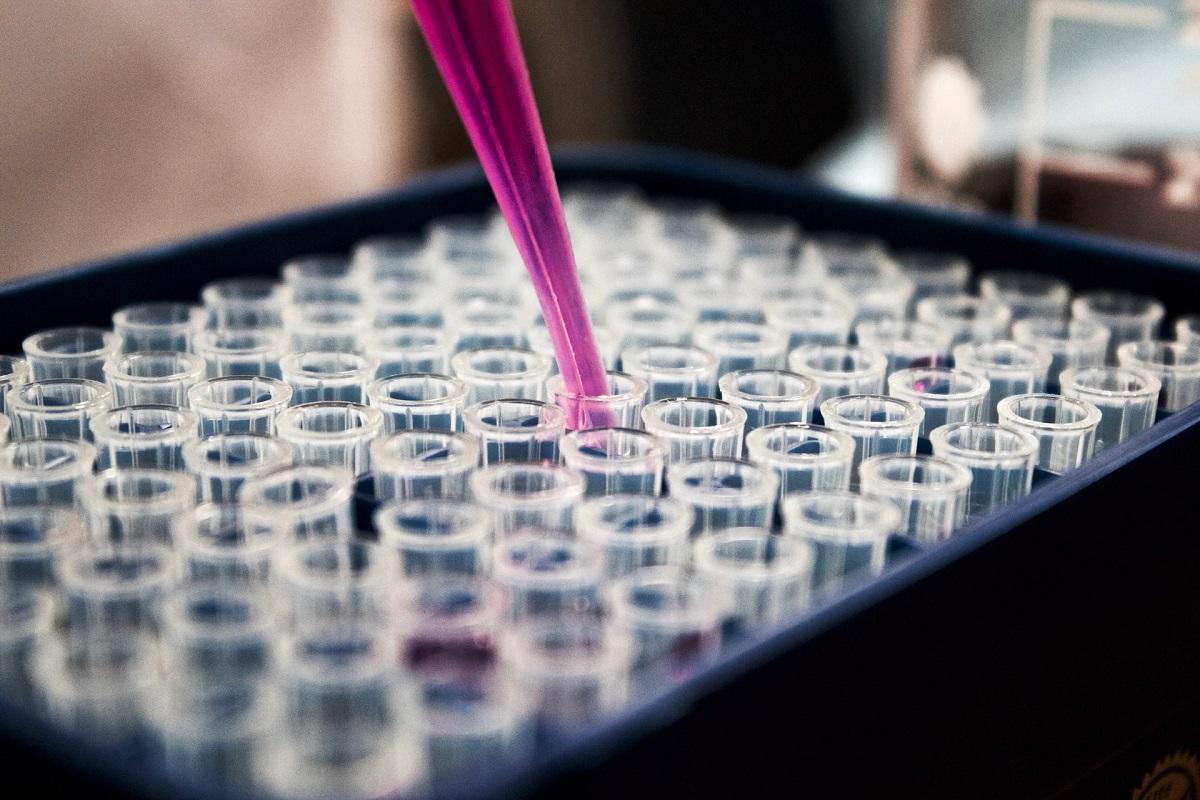 beakers being filled in lab