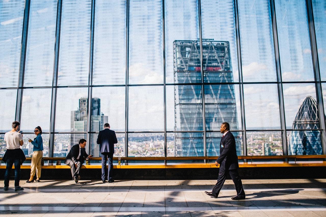 People set in financial backdrop