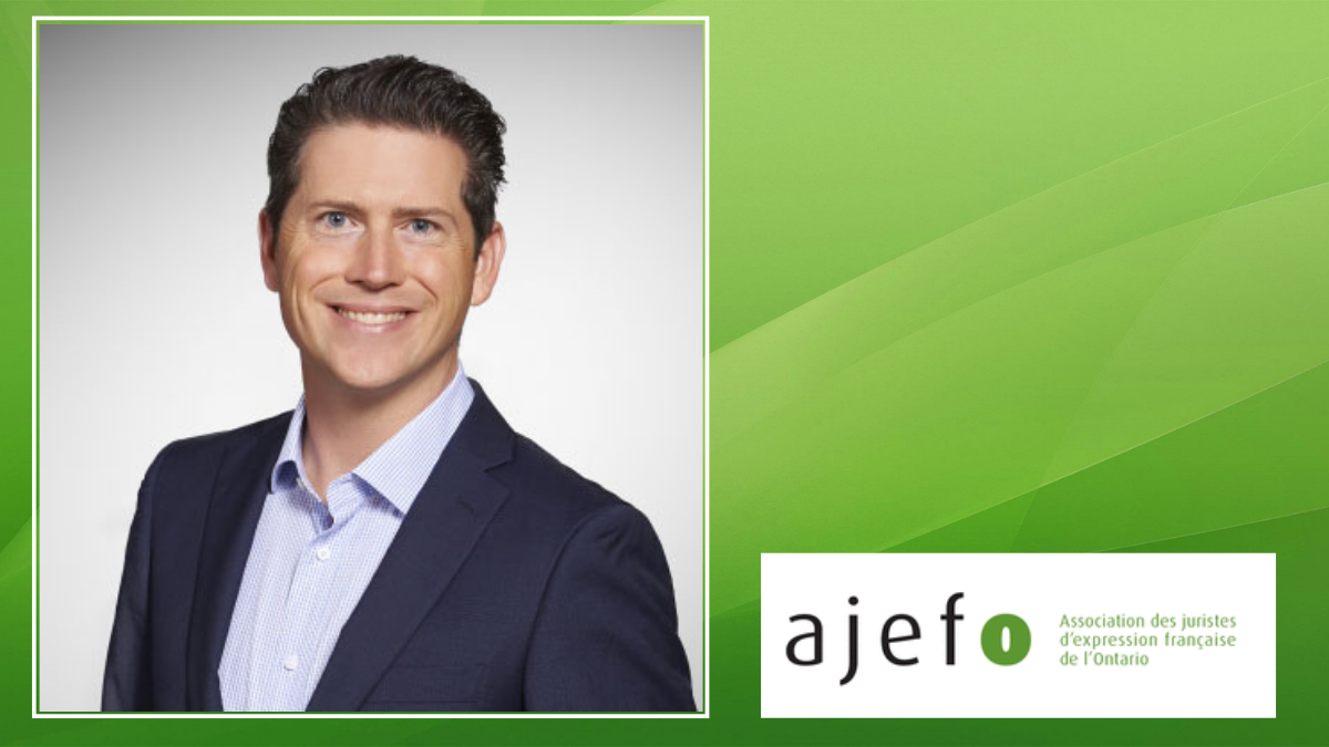 Professor Alain Roussy with AJEFO logo