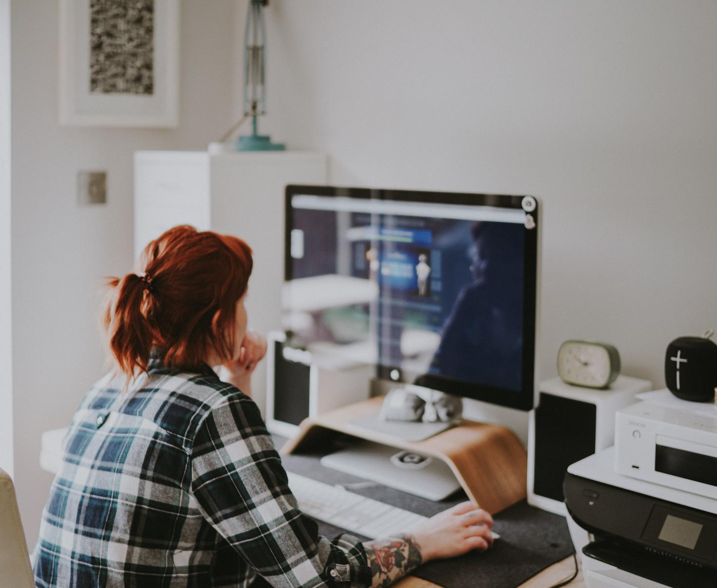 person sitting at a computer