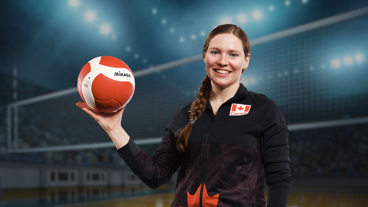 Annie Fergusson, 3L, holding a volleyball
