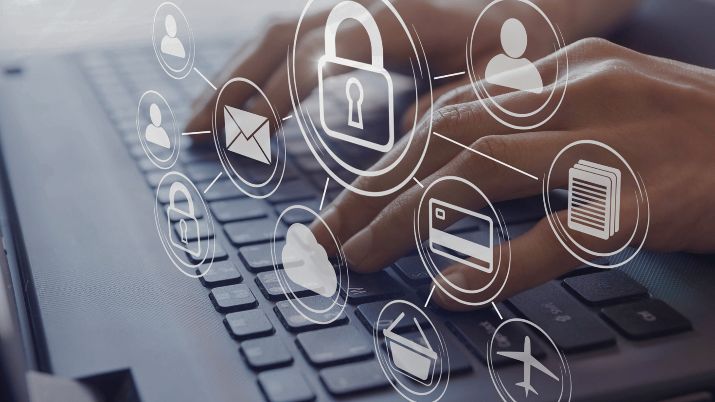 cyber security symbols overlayered a keyboard