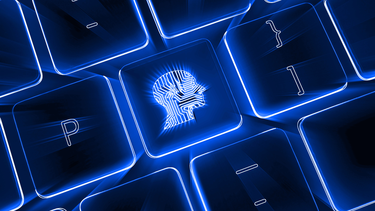 silhouette de visage humain gravé sur une touche de clavier d'ordinateur portable